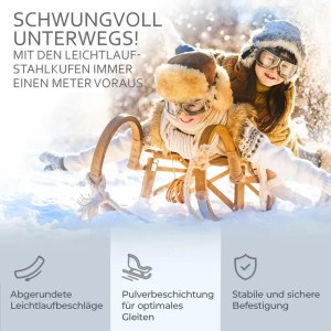 Zwei Kinder auf einem Bambiniwelt Hörnerrodel aus Buchenholz mit Leichtlauf-Stahlkufen gleiten fröhlich durch den Schnee.