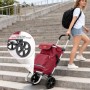 Sekey 3-in-1 Einkaufsroller rot mit Kühlfach und Frau auf Treppe. Praktischer Einkaufstrolley für unterwegs.
