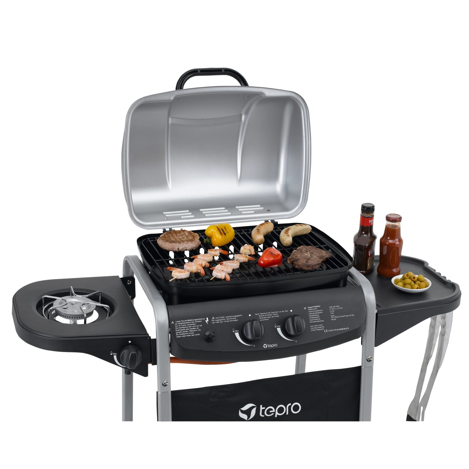 Tepro Gasgrill Fremont mit Grillgut und Seitenbrenner. Kompakter Grill in Schwarz/Silber.
