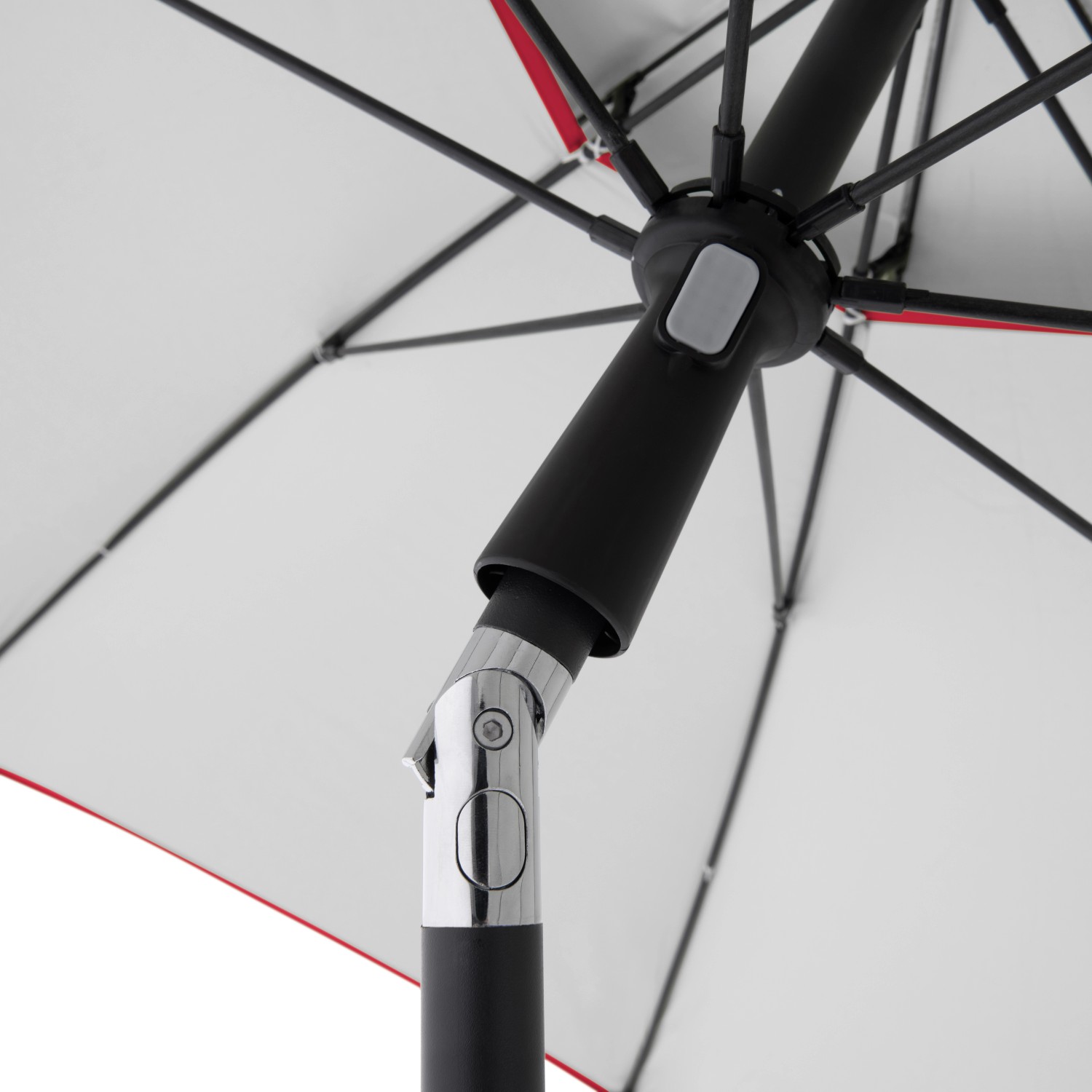 Detailaufnahme: Roter Doppler Windprofi Neo 200 Strandschirm, Fokus auf Knickvorrichtung und Windventil.