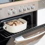 Respekta Küchenzeile: Brotbacken im Einbauherd mit Glaskeramikkochfeld in Edelstahloptik.