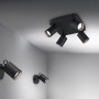 Trio Strahler Pago, schwarz matt, als Decken- und Wandspot im Raum.