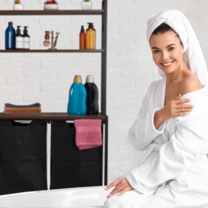 Relaxdays Wäschekorbregal MDF Baumwolle Eisen Schwarz Braun mit 2 Ausziehbaren Wäschekörben 162 cm x 80 cm x 34 cm 12,4 kg