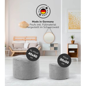 Graue mokebo Hocker in zwei Größen (40x60 cm und 30x50 cm) im Wohnzimmer.