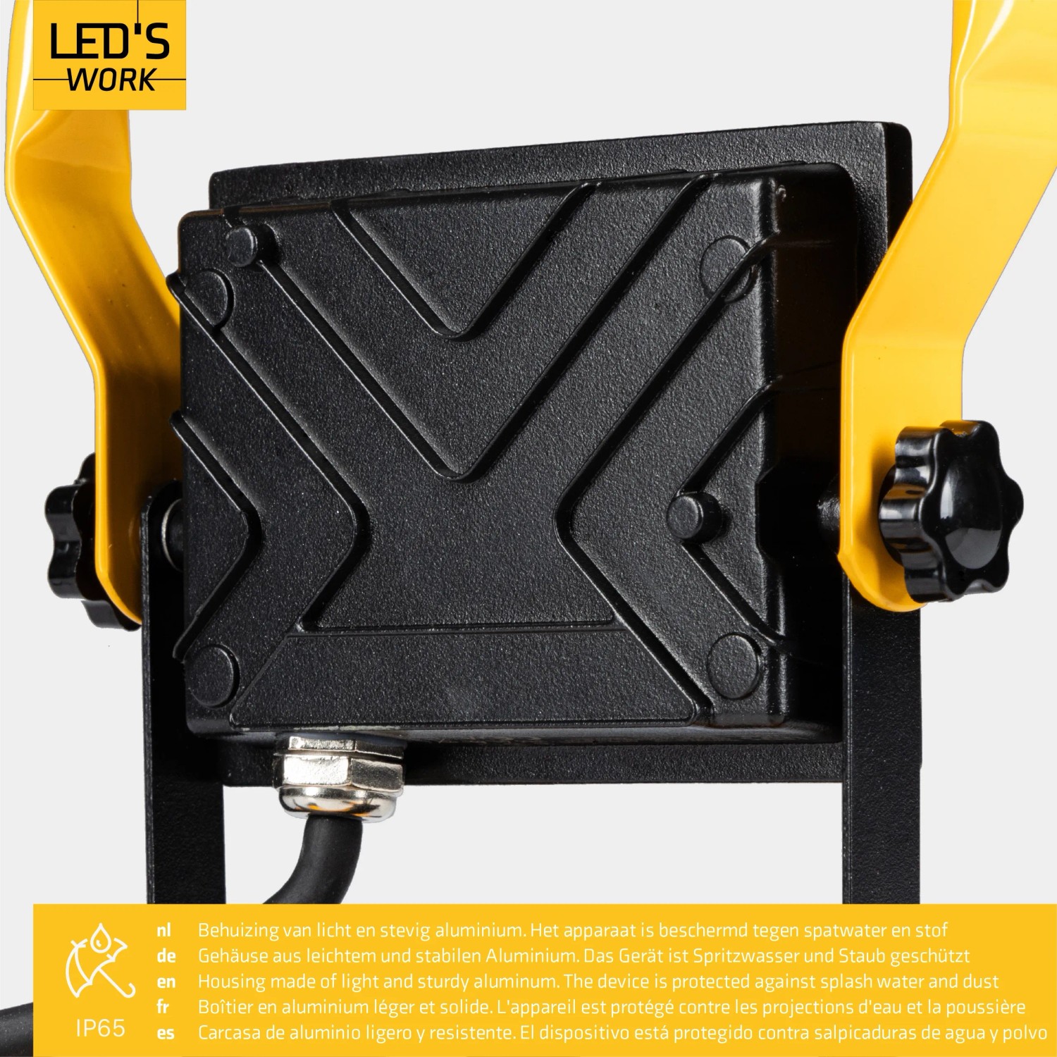 LED's Work Arbeitsleuchte (20W) Detail: Schwarzes Gehäuse mit gelbem Tragegestell.