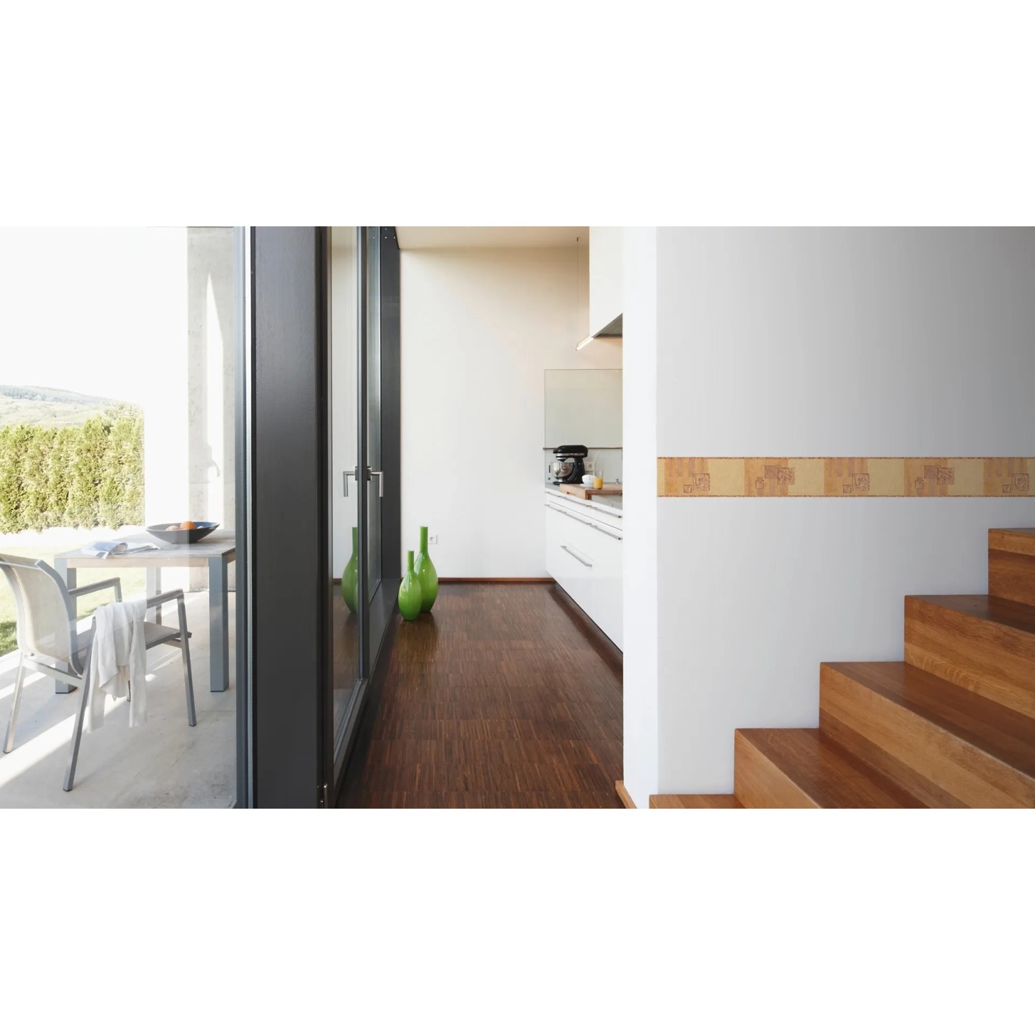 A.S. Creation Borte Muster Terra an Wand im Wohnraum. Selbstklebende Bordüre mit Terra-Muster.