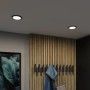 Zwei schwarze Paulmann LED Einbaupanels Areo VariFit, 11,8 cm, in Decke montiert.