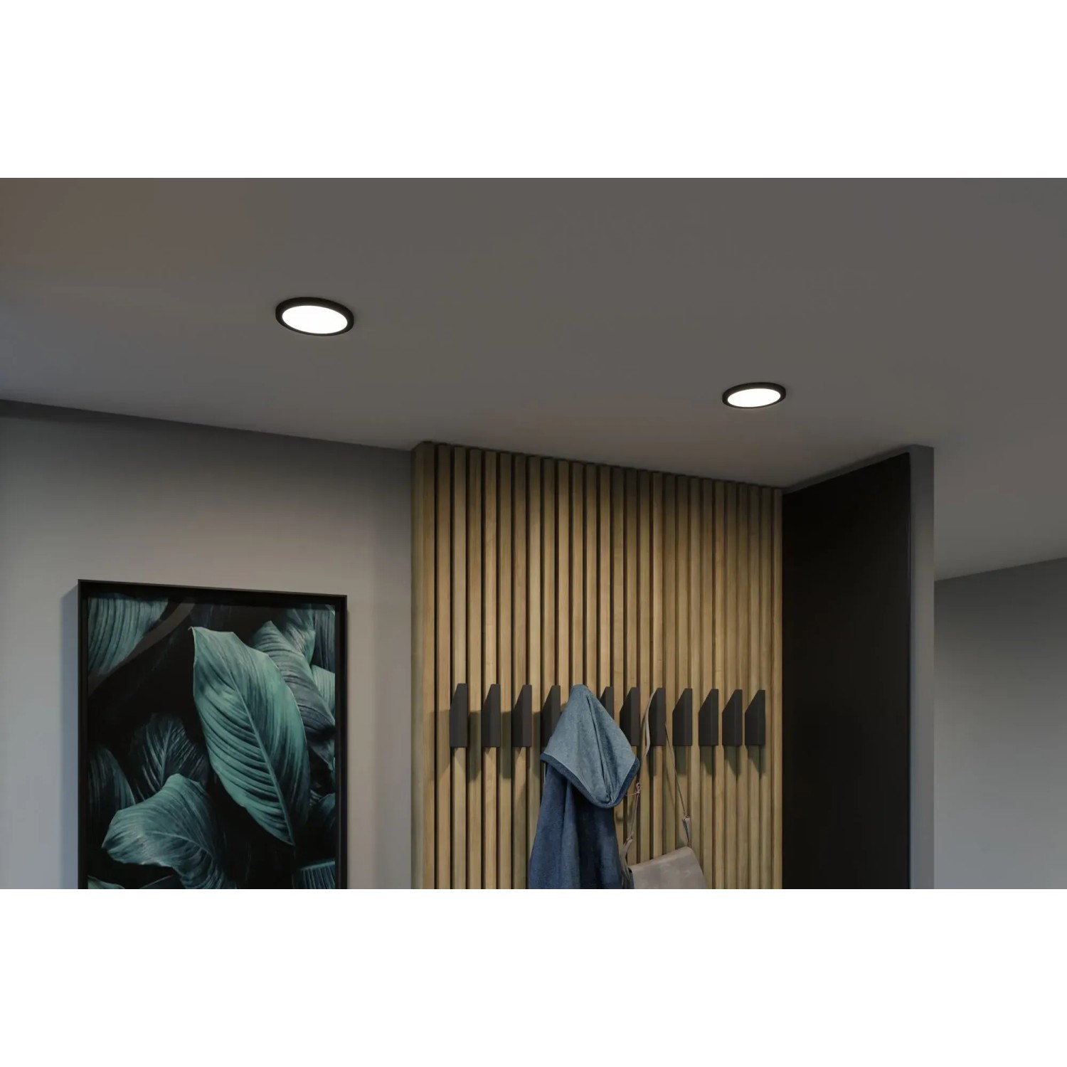 Zwei schwarze Paulmann LED Einbaupanels Areo VariFit, 11,8 cm, in Decke montiert.