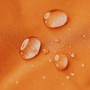 Detailaufnahme: Wasserabweisender, orangefarbener Bezug des Sitting Point Sessel Scuba mit Wassertropfen.