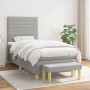 Hellgraues Boxspringbett 80x200 cm mit Matratze, Kopfteil und Bank. Stoffbezug, moderne Optik.