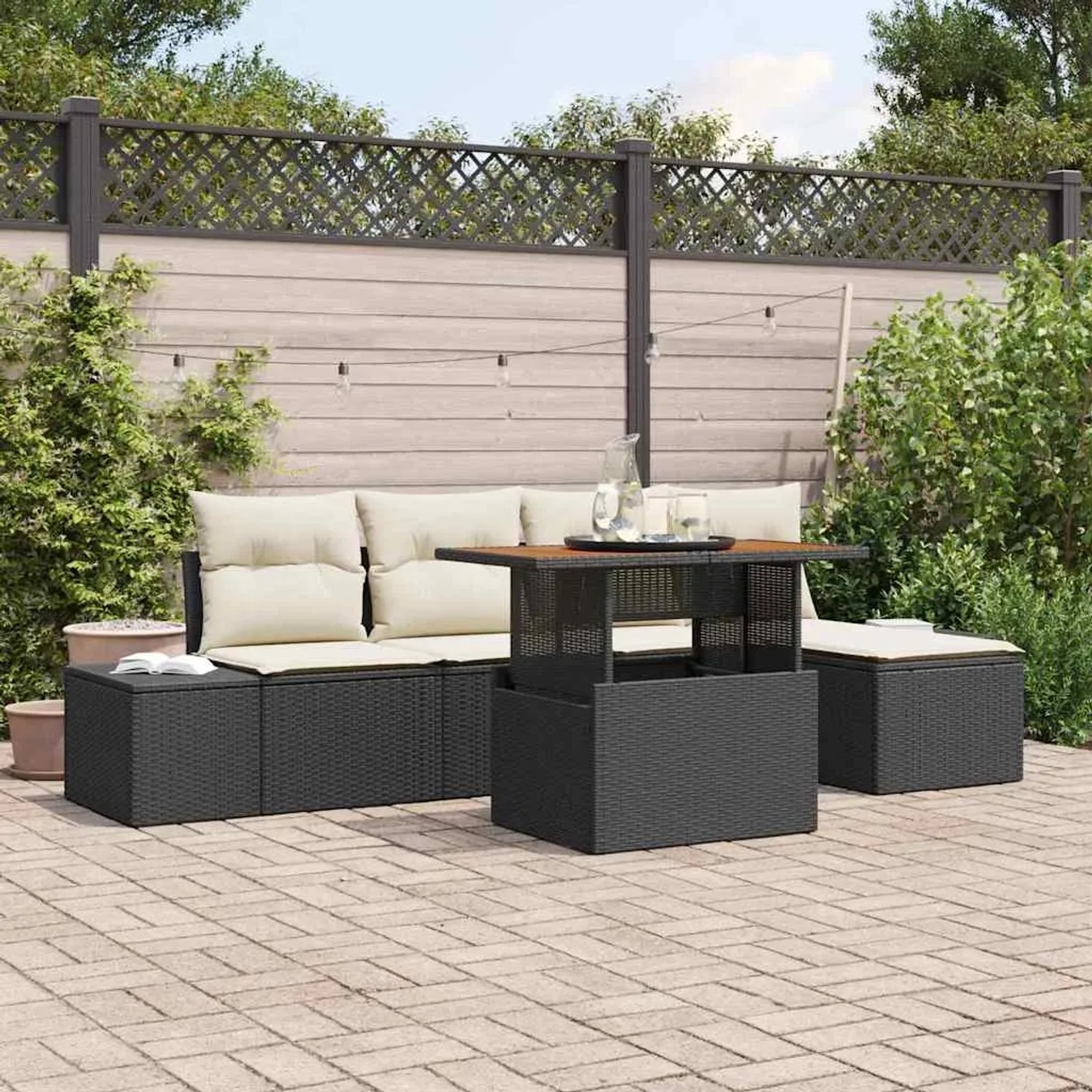 Schwarzes 6-tlg. vidaXL Garten-Sofa-Set aus Poly Rattan mit Tisch und Stauraum.