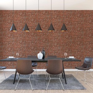 Rote Vliestapete in Steinoptik an einer Wand im Industrial-Stil Esszimmer. Zeigt Backsteinmuster.