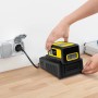 Kärcher Akku Battery Power 36 V/2,5 Ah auf Ladestation, gelb-schwarz.