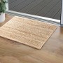 Fußmatte Jute Natural, 40x60 cm, vor einer Tür auf Holzboden. Natürliche Optik, robust und ideal für den Innenbereich.
