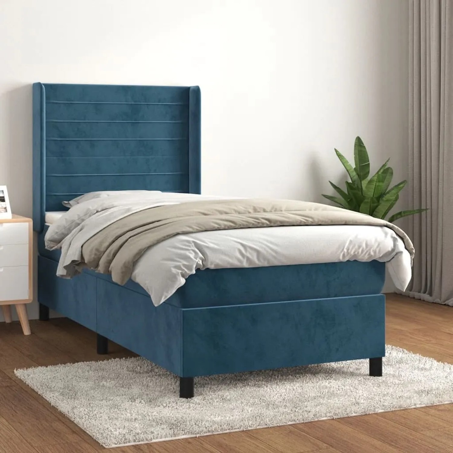 Dunkelblaues Boxspringbett (80x200 cm) mit Matratze und Samtbezug.