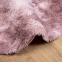 Runder Shaggy Hochflorteppich NAVARRA in Altrosa auf Holzfußboden. Weicher Polyester-Teppich mit 3,5 cm Florhöhe.