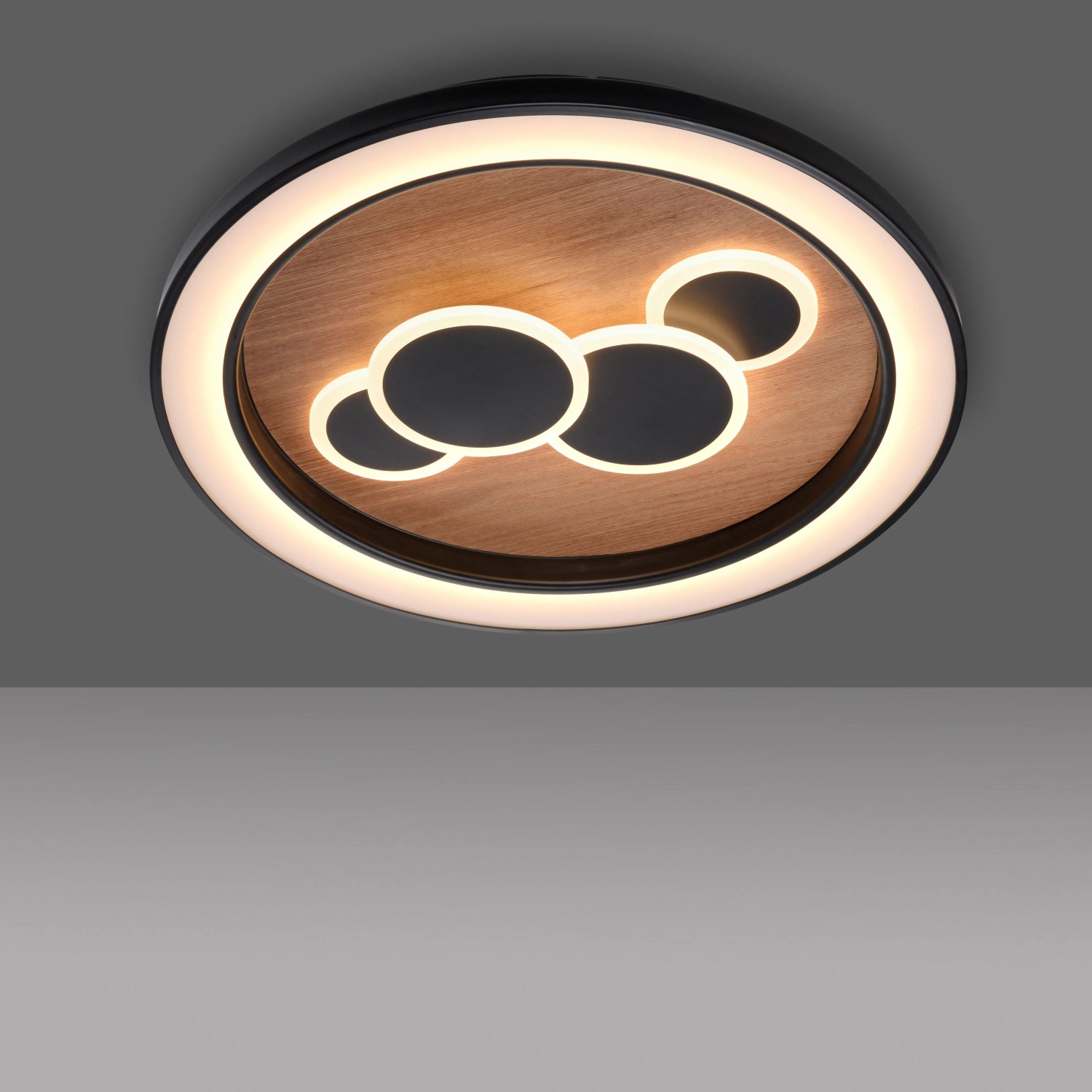 LED-Deckenleuchte Eliza von Paul Neuhaus: Rund, Holz-Natur, schwarz, mit LED-Kreisen.