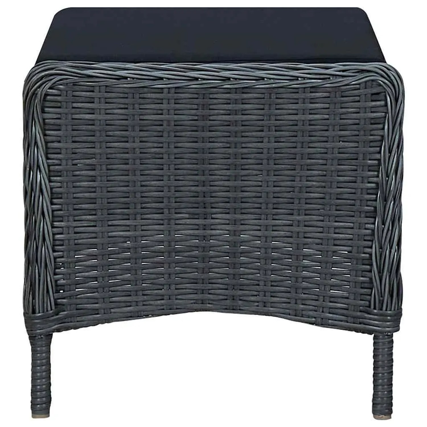 Dunkelgrauer Poly-Rattan Fußhocker mit schwarzem Kissen. Geflochtene Struktur, ideal für Gartensessel.