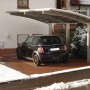 Ximax Carport Portoforte-110 im Edelstahl-Look mit Auto. Einzelcarport mit gebogenem Dach und transparenten Platten.