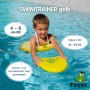 Kind mit gelbem Freds Swim Academy Schwimmreifen Classic im Wasser, geeignet für Kinder von 4-8 Jahren.