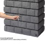 Garantia Wandtank Rocky Junior 300 l Dark Granite in Steinoptik mit Wasserhahn als Anwendungsbeispiel.