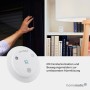 Homematic IP Alarmsirene für Innenräume, Teil der Hausautomation, mit akustischem und optischem Signal.