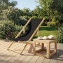 5er Set: Schwarzer, klappbarer Holz-Liegestuhl mit Beistelltisch im Garten.