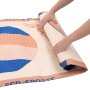 Aufgerolltes, apricotfarbenes Stand Up Paddle Board Makani von ECD Germany.