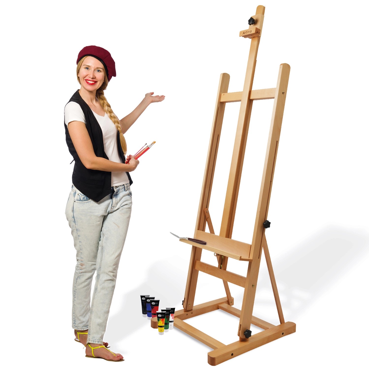 Artina Siena Staffelei aus Buchenholz mit Malerin und Farben.