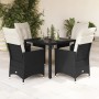 Schwarze 5-tlg. vidaXL Garten-Essgruppe aus Polyrattan mit cremeweißen Kissen.