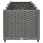 Hellgraues vidaXL Hochbeet (160x40x38 cm) in Rattan-Optik aus Polypropylen.