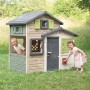 Smoby Life Spielhaus Evo Friends mit Kindern im Garten, Fassade in Steinoptik, erweiterbar mit Zubehör.
