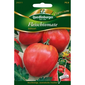 Quedlinburger Fleisch-Tomate Oxheart Saatgut Packung mit herzförmigen, roten Tomaten.
