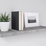 Wandregal Carlton in Betonoptik, 60 cm breit, mit Deko-Elementen wie Pflanze, Büchern und Bilderrahmen.