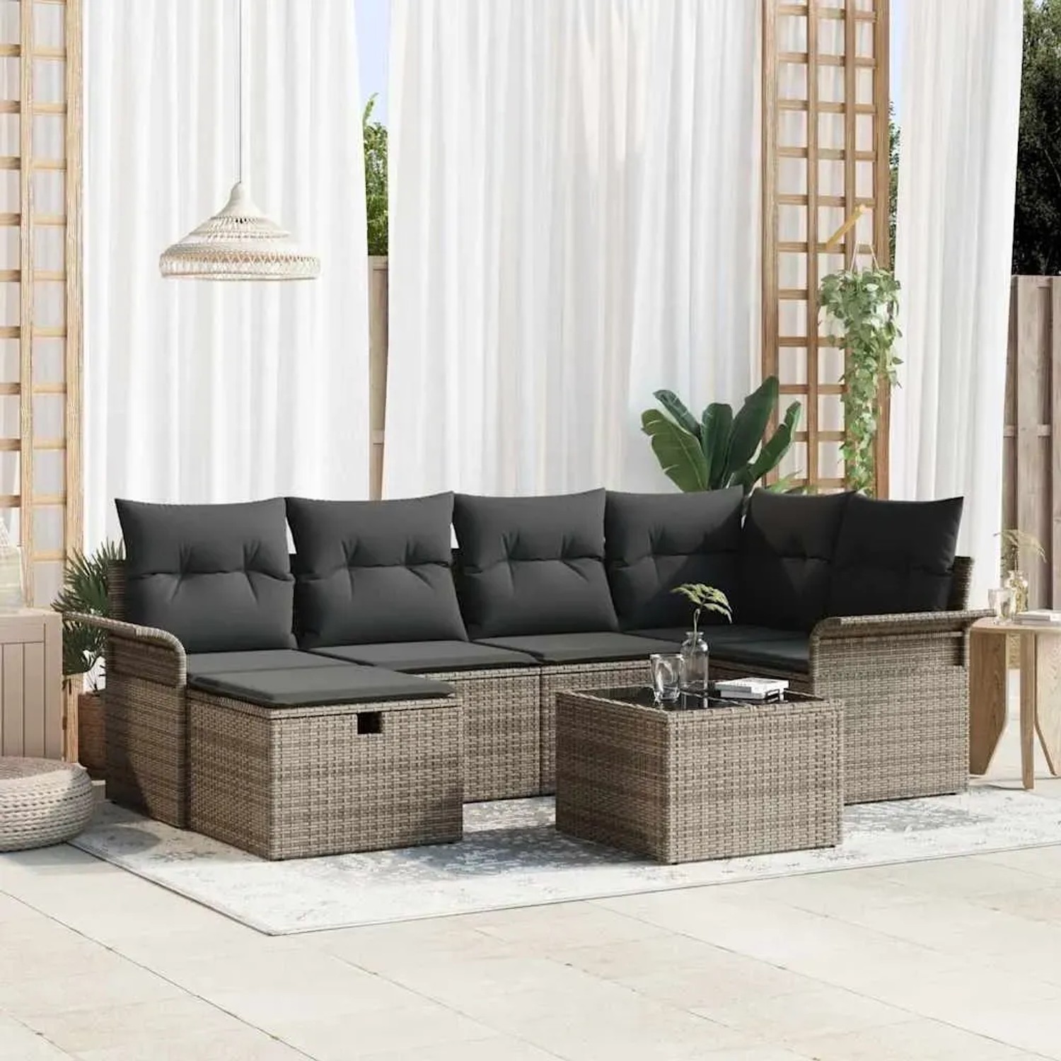 Graues 7-teiliges vidaXL Garten-Sofa-Set aus Poly Rattan mit Kissen und Stauraum.