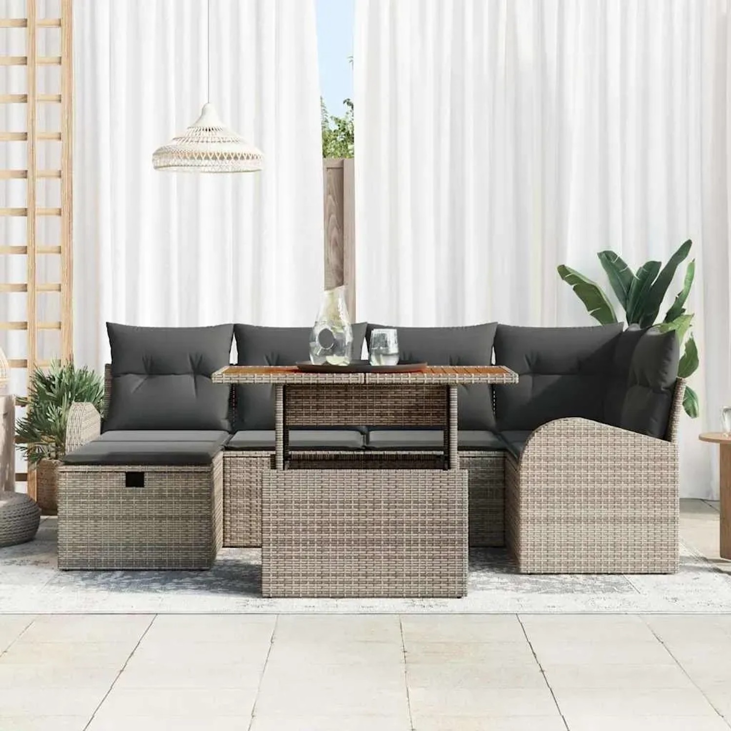 Graues 7-teiliges vidaXL Garten-Sofa-Set aus Rattan mit Kissen und Tisch mit Stauraum.