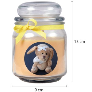 Gelbe Duftkerze im Glas mit Hunde-Motiv und Vanille-Duft. Dekorative Kerze für entspannte Atmosphäre.