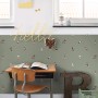 ESTAhome Vliestapete mit Fußballspielerinnen in Graugrün im Kinderzimmer.
