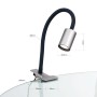 Silberne Orion LED Klemmleuchte mit flexiblem Schwanenhals für Schreibtisch oder Regal.