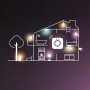 Grafik: Haus-Umriss mit Philips Hue Leuchten im Garten und Innenräumen.