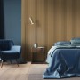 Schlafzimmer mit FN Acustico Akustikpaneel Eiche Natur an der Wand.