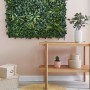 Runder, creme-farbener Luxor Living Teppich Ivo (Ø 60 cm) aus Jute im Wohnzimmer.