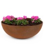 Hellgraue, marmorierte Pflanzschale (19x6 cm) von matches21 mit pinkfarbenen Blumen bepflanzt.