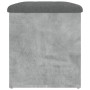 Betongraue Sitzbank mit Stauraum und dunklem Kissen, Möbel für Flur oder Wohnzimmer.
