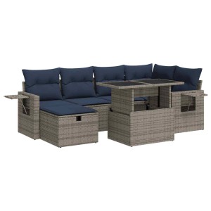 Graue 7-teilige Garten-Sofagarnitur aus Polyrattan mit marineblauen Kissen und Tisch.