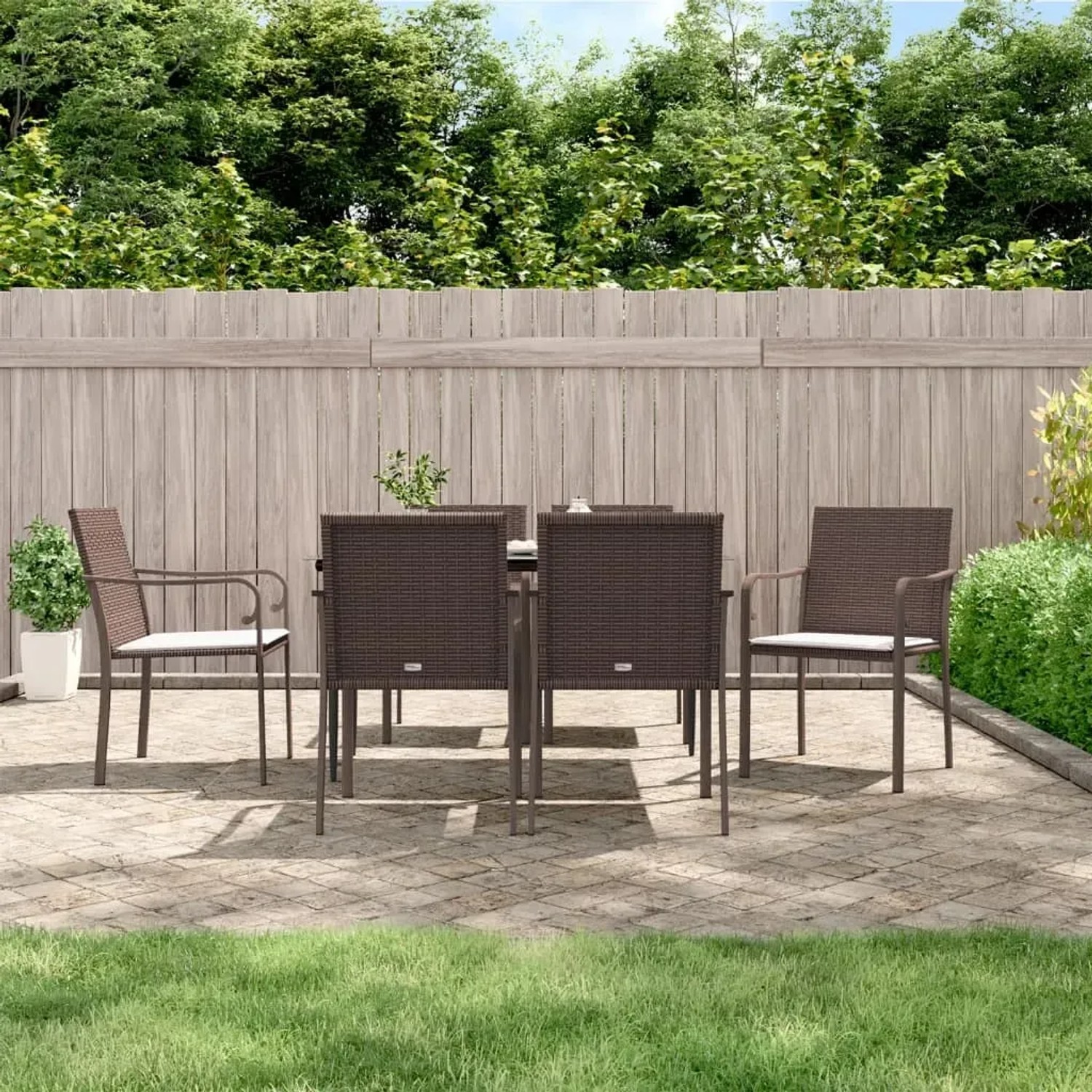 7-teilige Garten-Essgruppe aus Poly Rattan und Stahl mit Kissen. Gartenmöbel-Set für Terrasse und Garten.