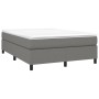 Dunkelgraues vidaXL Boxspringbett (140x200 cm) mit Stoffbezug und schwarzen Füßen.