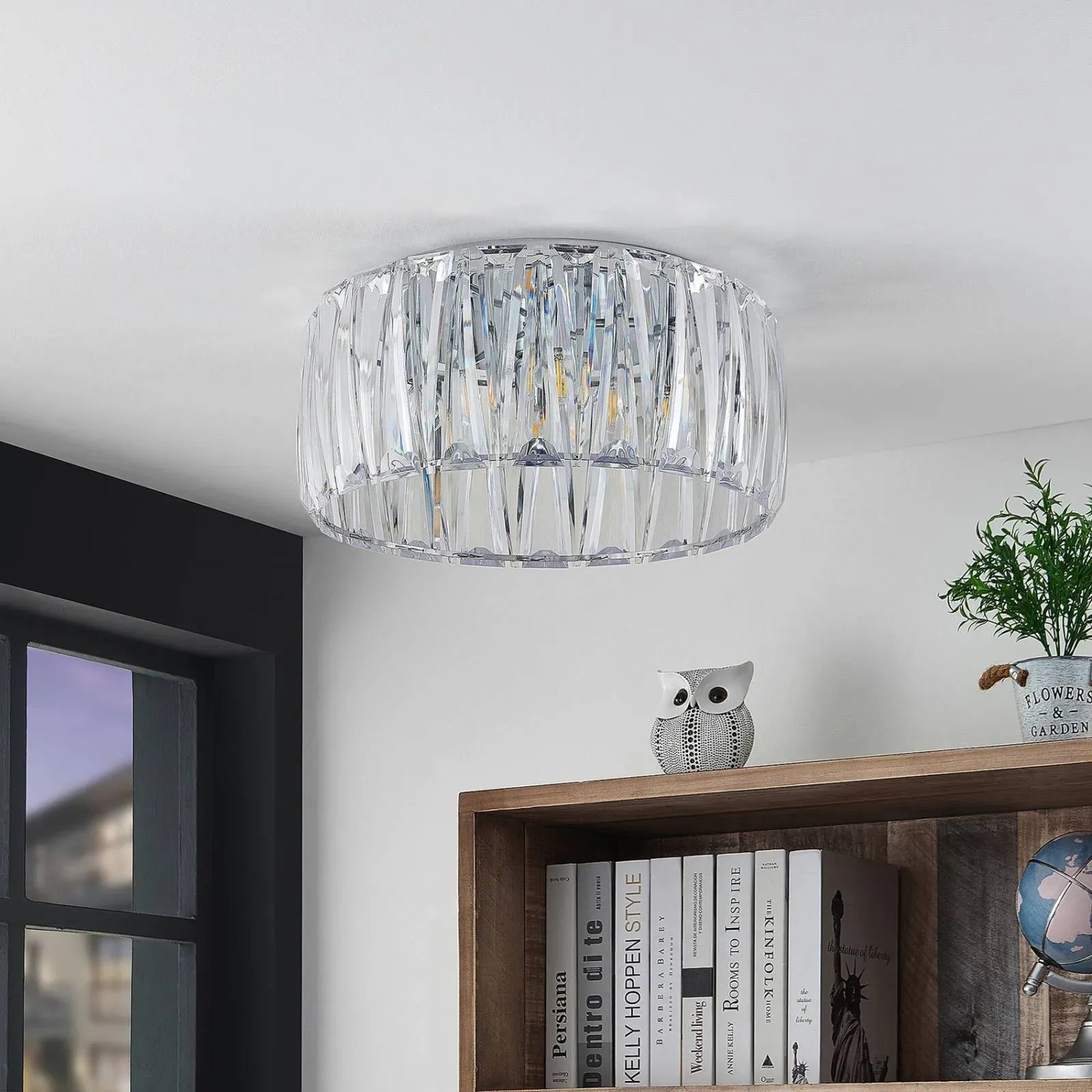Moderne, transparente Lindby Deckenlampe Sofia mit vier E14-Fassungen für Wohnzimmer.