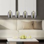 Moderne 5-flammige LED-Pendelleuchte Metropolis mit Chrom und Rauchglas über Wohnzimmer.