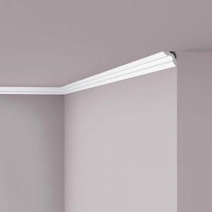 Weiße NOEL & MARQUET NMC A3 Eckleiste als Zierleiste an Wand und Decke.